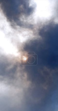 Photo for Smoke from fire on outskirts of the city after an air strike by Russian aircraft on the city. Horrors of war in Ukraine. Black smoke against sky. Fire during the war. Disaster - Royalty Free Image