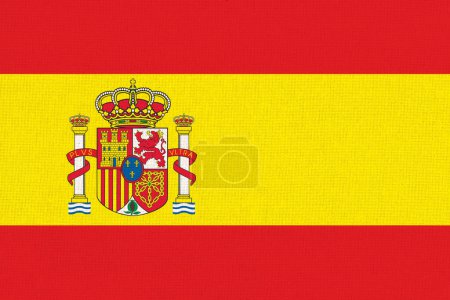 Flagge Spaniens. Spanische Nationalflagge auf Stoffoberfläche. Spanische Nationalflagge auf strukturiertem Hintergrund. Textur. Republik Spanien. Europäisches Land. Spaniens Staatssymbol