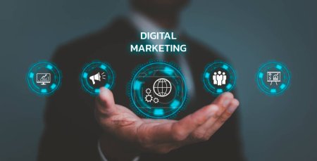 Photo for Hand shows the sign and icon of Digital marketing internet advertising and sales increase business technology concept, online marketing, E-business, Ecommerce, Business online. - Royalty Free Image
