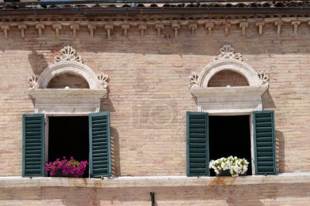 Exterior of historic buildings in Ascoli Piceno, Marche, Italy: Piazza del Popolo, main square of the city
