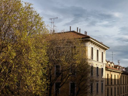 Old residential buildings along via Biondi in Milan, Lombardy, Italy