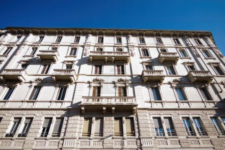Facade of historic residential building along corso Sempione in Milan, Lombardy, Italy