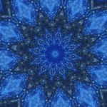 Glitter mandala. Ethnic kaleidoscope. Defocused blue color glowing particles texture symmetrical star ornament abstract art background.