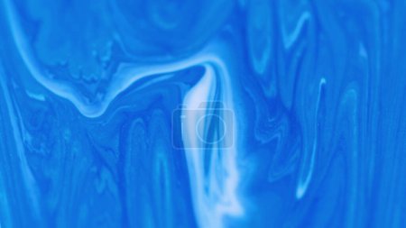 Paint flow. Shimmer liquid. Sparkling water art. Defocused blue white color drip ink wave fluid wet gel emulsion motion abstract background.