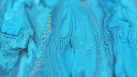 Color liquid shimmer. Paint flow. Blur neon blue glitter drip fluid serum mix bubble particles water ink wave motion art abstract background.