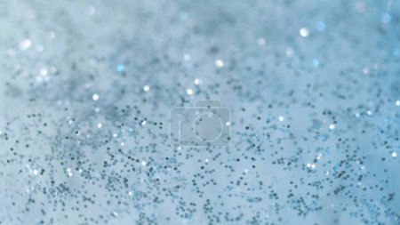 Photo for Shimmer liquid. Paint swirl. Defocused blue blink sequins particles shiny fluid brilliance glitter paint bokeh abstract art background. - Royalty Free Image