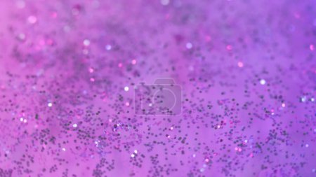 Photo for Bright paint. Neon ink. Blink light. Defocused pink violet purple color flash luminescent liquid sparkling celebrate sequins swirl bokeh abstract art background. - Royalty Free Image