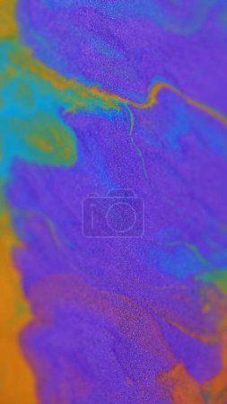 Ink drip. Glitter fluid texture. Blur purple orange golden cyan color shimmering metallic sand particles acrylic liquid paint pigment circles spill abstract art background.