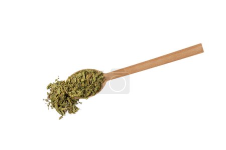 Photo for Dried leaves o Lemon verbena in latin Aloysia citrodora on wooden spoon isolated on white background. Medicinal. herb. Lemon verbena leaf extract is used for its energizing and refreshing properties, lemony scent. - Royalty Free Image