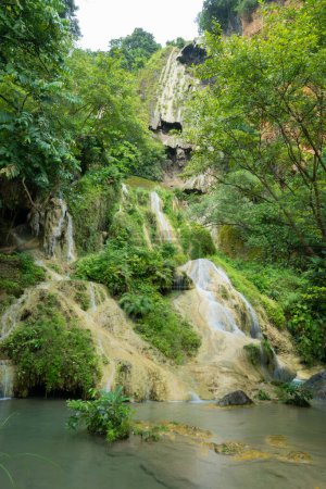 Photo for Erawan Waterfall. Nature landscape of Kanchanaburi district in natural area. it is located in Thailand for travel trip on holiday and vacation background, tourist attraction. - Royalty Free Image