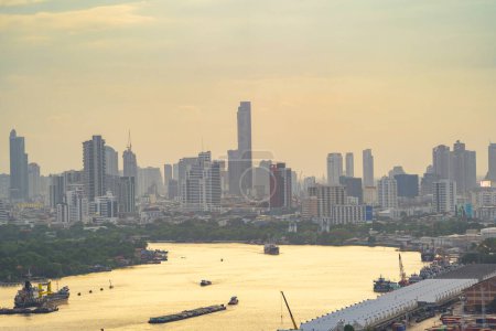 Photo for Aerial view of Bangkok Downtown Skyline, Thailand. Financial district and business centers in smart urban city in Asia. Skyscraper and high-rise buildings at sunset. - Royalty Free Image