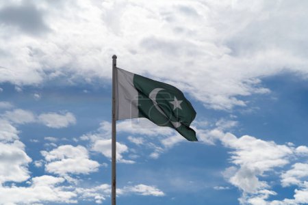 Photo for Pakistan national flag blowing in the wind isolated on high mountain hills. Official patriotic design. waving sign symbol. - Royalty Free Image