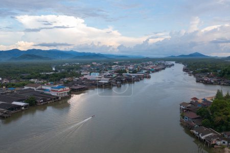 Photo for Aerial view of Ranong City, The Floating village urban city town houses, lake sea or river. Nature landscape fisheries and fishing tools, Thailand. Aquaculture farming - Royalty Free Image