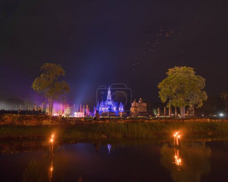 Photo for Sukhothai Historical Park festival, buddha pagoda stupa in a temple, Sukhothai, Thailand. Thai buddhist temple architecture at night. Tourist attraction. - Royalty Free Image