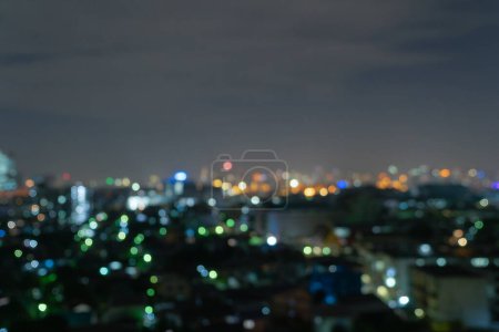 Photo for Bokeh abstract background of skyscraper buildings in Bangkok city, Thailand with lights, Blurry photo at night time. Cityscape. - Royalty Free Image