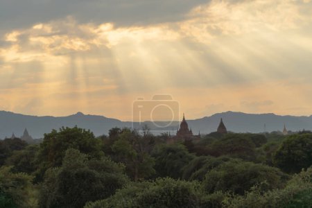 Photo for Burmese temples of Bagan City from a balloon, unesco world heritage with forest trees, Myanmar or Burma. Tourist destination. - Royalty Free Image