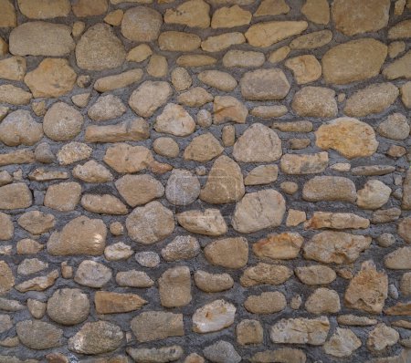 Téléchargez les photos : Pierre de gravier granit roches revêtement de sol texture de surface motif. Gros plan du matériau extérieur pour le fond de la décoration design. Décombres - en image libre de droit