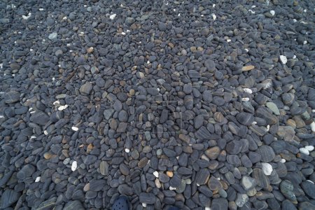 Photo for Granite gravel stone rocks flooring pattern surface texture on sea lake. Close-up of exterior material for design decoration background. Rubble - Royalty Free Image