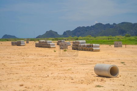 Photo for Drainage Concrete Pipe with mountain hills. - Royalty Free Image