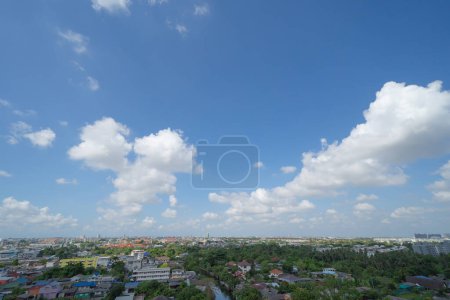 Photo for Clear blue sky with white fluffy clouds at noon. Day time. Abstract nature landscape background. - Royalty Free Image