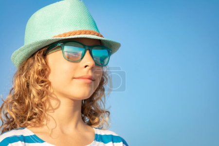 Photo for Beautiful girl on summer vacation. Happy teenager having fun on the beach - Royalty Free Image