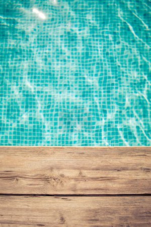 Photo for Wooden background against blurred water. Summer vacation concept - Royalty Free Image