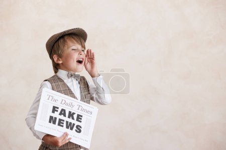 Photo for Newsboy shouting against grunge wall background. Boy selling fake news. Child wearing vintage costume. Kid holding newspaper. Social media and Internet nerwork concept - Royalty Free Image
