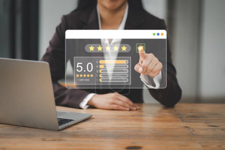 Photo for Users rate their service experience in an online application for a customer satisfaction feedback survey - Royalty Free Image