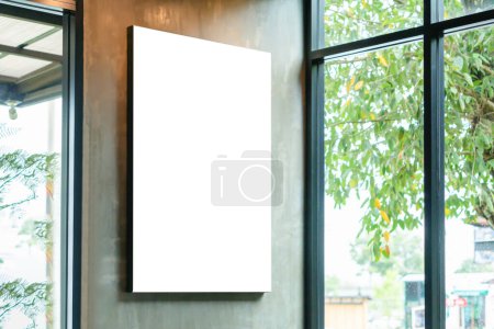 Photo for Mockup image of Blank billboard white screen posters for advertising, Blank photo frames display in coffee shop for your design - Royalty Free Image