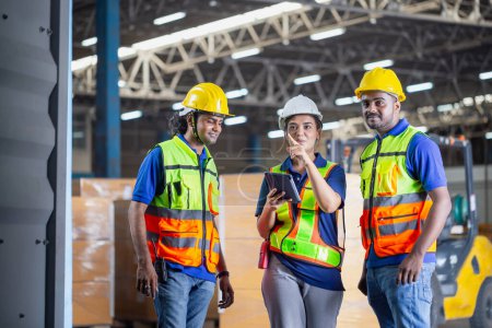 Photo for Foreman workers working in warehouse talking about job, Warehouse worker team checking containers boxes, Workers team taking inventory in factory warehous - Royalty Free Image
