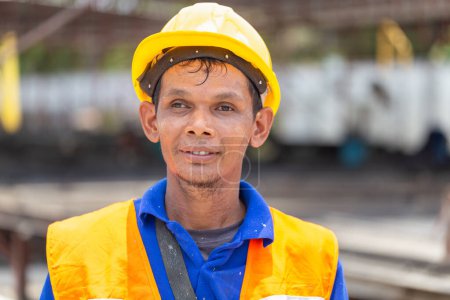 Foto de Portrait of factory worker man in hard hat at the precast factory site, Worker man on construction site - Imagen libre de derechos