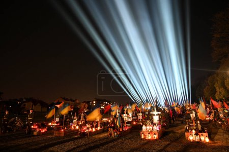 Photo for Lviv, Ukraine - February 23, 2023: Lychakiv Cemetery with a light installation to mark the first anniversary of Russia's war against Ukraine. - Royalty Free Image