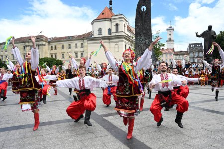 Photo for Lviv, Ukraine - June 28, 2023: People dance traditional Ukrainian dances during the celebration of the Constitution Day of Ukraine in the city of Lviv. - Royalty Free Image