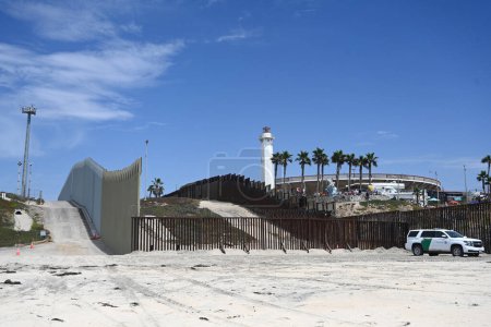 Photo for Border Field State Park Beach, CA, USA - July 30, 2023: The USA Mexico Border Wall near Friendship Park and Tijuana Beach Promenade, Mexico. - Royalty Free Image