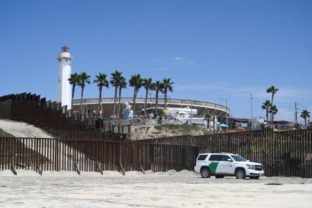 Photo for Border Field State Park Beach, CA, USA - July 30, 2023: The USA Mexico Border Wall near Friendship Park and Tijuana Beach Promenade, Mexico. - Royalty Free Image