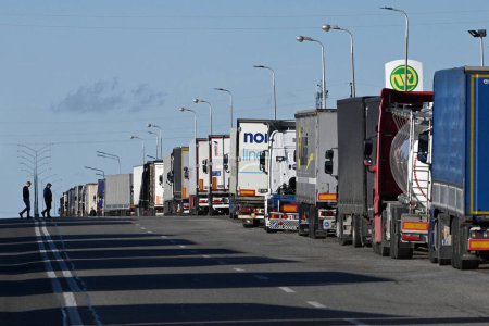Photo for Lviv region, Ukraine - November 9, 2023: A trucks stay at long line near the Rava-Ruska border checkpoint on the Ukrainian-Polish border. - Royalty Free Image