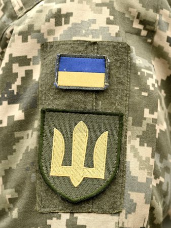 Photo for Ukrainian flag on military uniform.  Armed Forces of Ukraine. Ukrainian soldier. Ukrainian in army. - Royalty Free Image