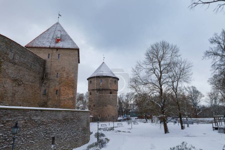 Tallinn old town defense towers and wall view at winter. Snowy weather