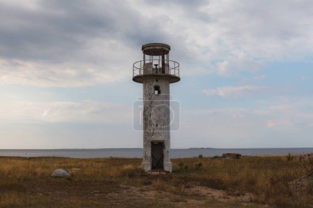 Photo for Abandoned old lighthouse on Cape Neeme at Baltic coast in Estonia - Royalty Free Image