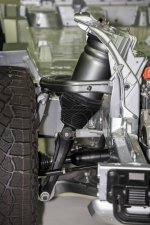 Téléchargez les photos : Close-up and cut sectional view of the new automotive suspension system. - en image libre de droit