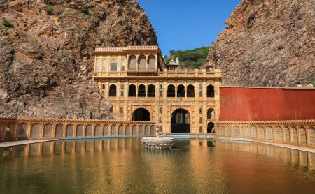 Photo for Jaipur, Rajasthan, India - October 12, 2022: Exterior view of Historic Hindu temple called Galta ji temple is a prehistoric Hindu pilgrimage site located near Jaipur city in India. - Royalty Free Image