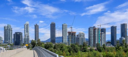 Photo for BURNABY, CANADA - JUNE 29, 2023: Panoramic view of a cityscape in Metrotown, Burnaby, Canada, it is British Columbia's third-largest city by population. - Royalty Free Image