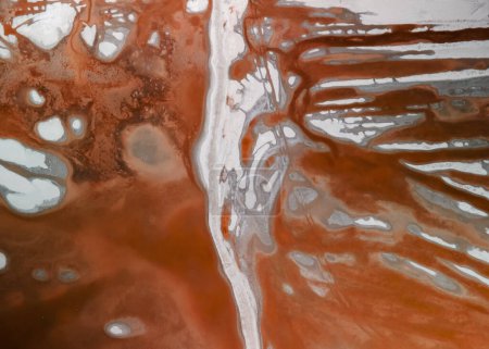 Aerial view of colorful Alkali flats at Owens Lake, California. Abstract background.