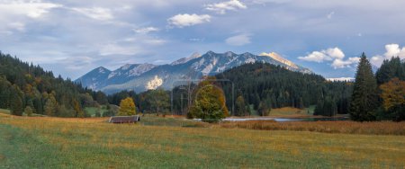 Scenic panoramic landscape of fields and mountains at Garmisch-Partenkirchen in Germany