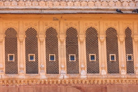 Row of arched windows intricate architecture of historic Junagarh Fort in Bikaner, Rajasthan, India.