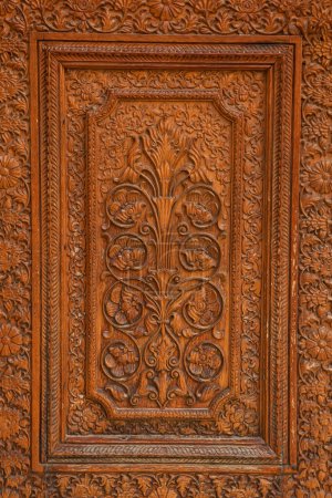 The intricate design carved on red wood at Junagarh fort , Bikaner, Rajasthan, India