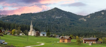 Panoramic aerial view of scenic Gosau village in the middle of Alps mountains in Austria.