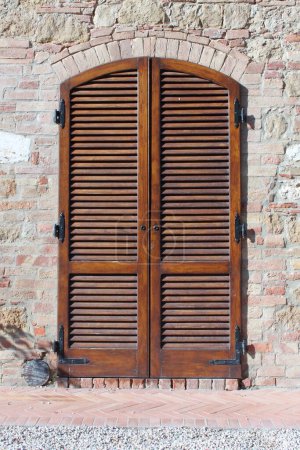 Photo for Italian style house entrance with shutters - Royalty Free Image
