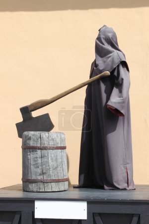 Photo for Medieval executioner with an ax - Royalty Free Image