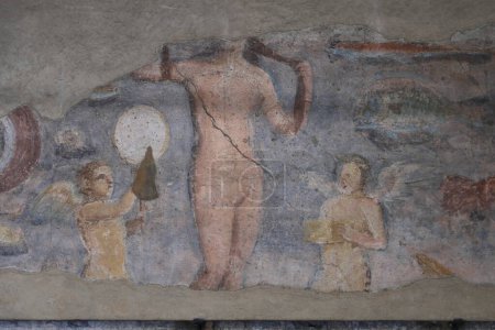 Old roman fresco with Eros and Minerva in Ostia Antica, Italy